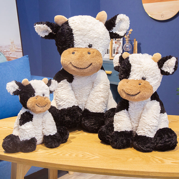 peluche vache noire et blanche - idee cadeau enfant - theme animaux de la ferme