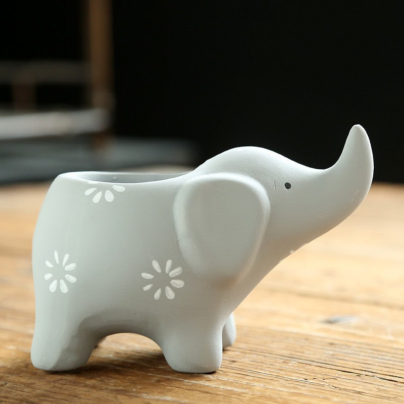 Cache-pot bébé éléphant céramique gris perle — motifs fleurs blanches, trompe levée, pot à succulentes kawaii fait main