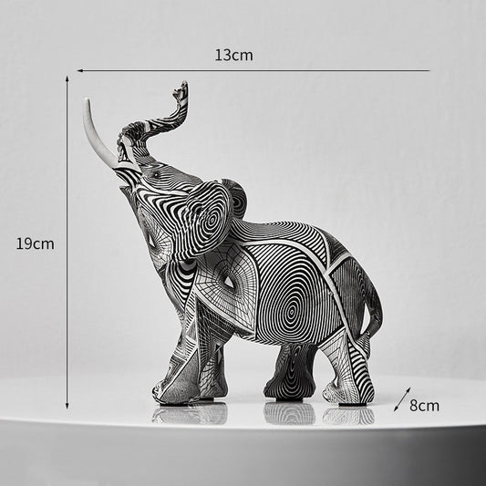 Éléphant décoratif géométrique en résine trompe levée, en noir et blanc