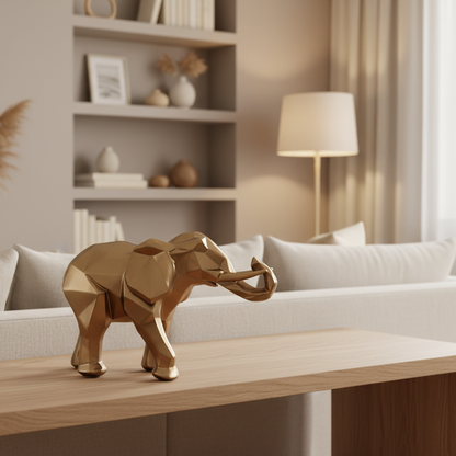 Statue éléphant doré origami posée sur un meuble blanc – décoration intérieure 