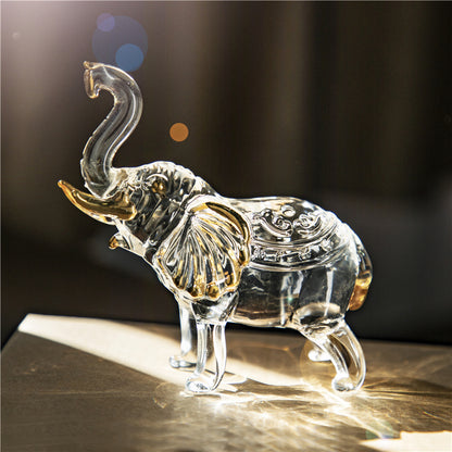 statuette éléphant en verre trompe levée 