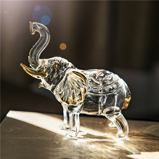 statuette éléphant en verre trompe levée 