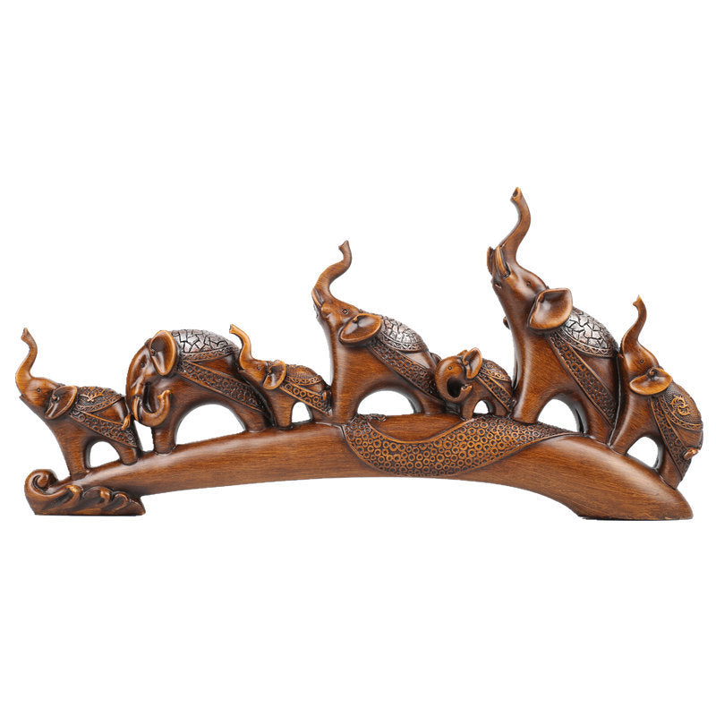 Composition 7 éléphants décoratifs bronze – vue de face sur fond blanc