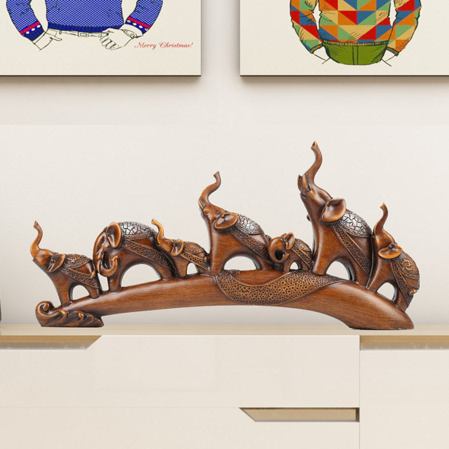 Composition 7 éléphants en résine bronze sur socle arqué – décoration feng shui salon