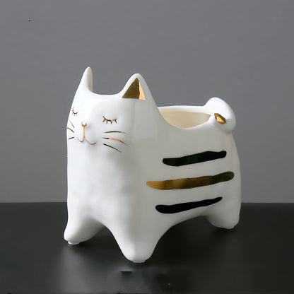 Un joli vase chat en céramique blanc et or, parfaite comme idée cadeau pour les amoureux des chats 